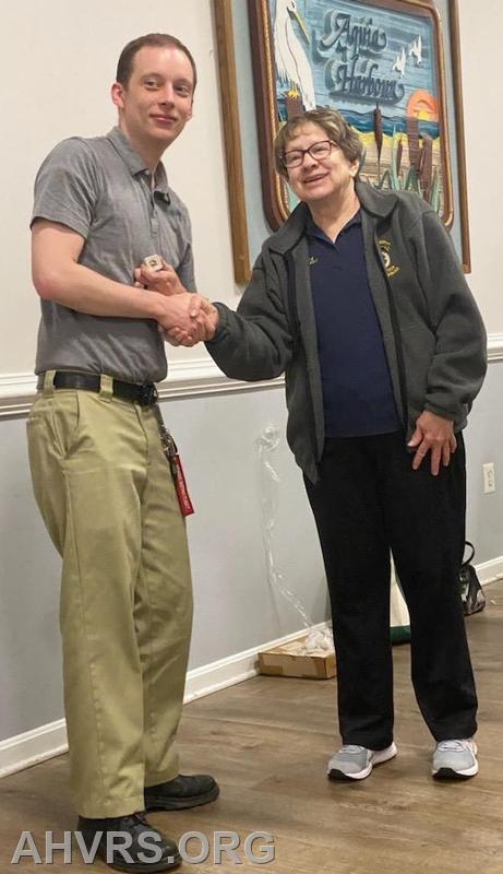 Nick receives his 2 year service pin