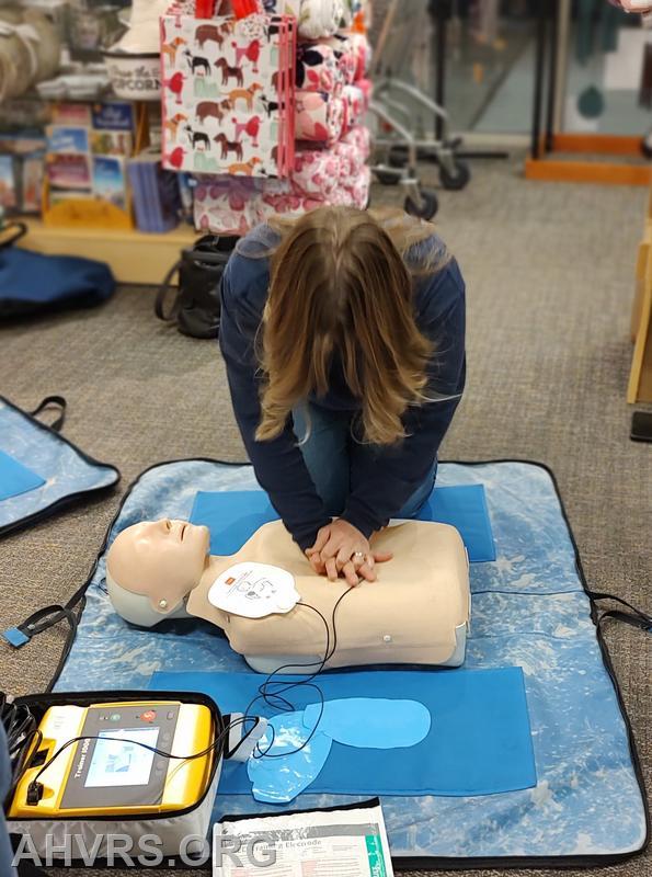 Hands Only CPR  training with staff at Hallmark store