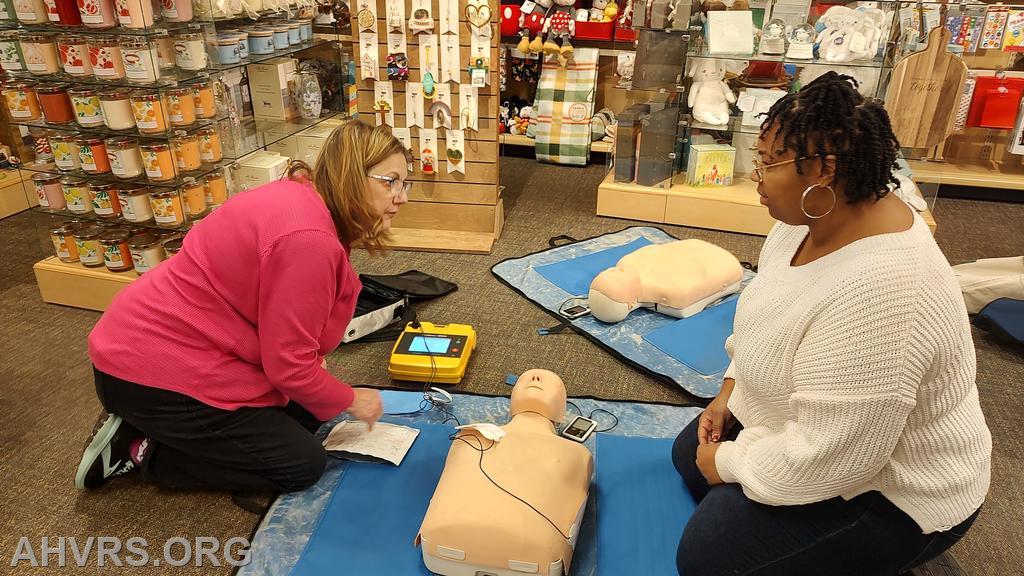 Hands Only CPR  training with staff at Hallmark store