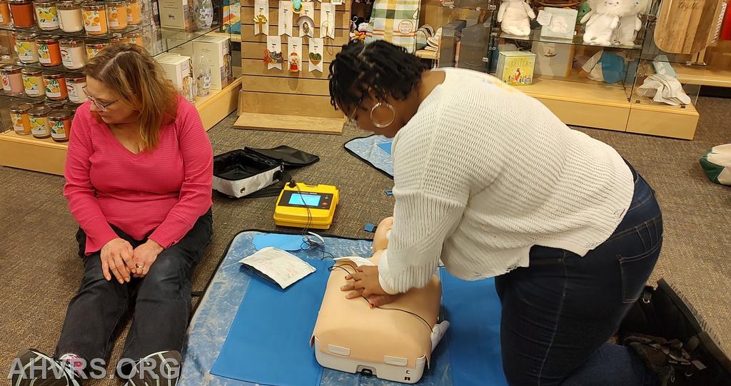 Hands Only CPR  training with staff at Hallmark store