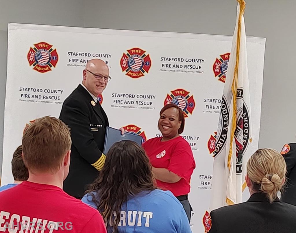 Volunteer Fire And EMT class Graduation
Natasha with Chief Cardello