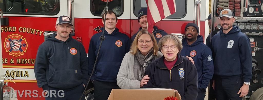 Eng and Ambulance crew with Hallmark manager Laverne