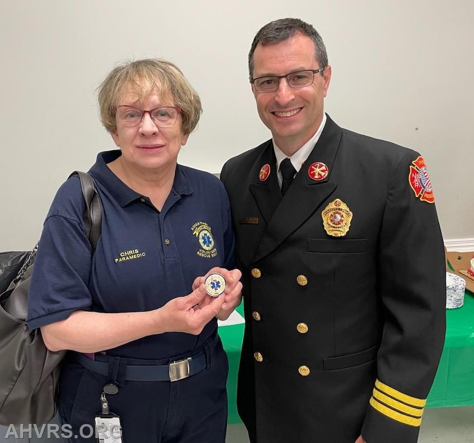 Chris with Chief Brian Frankel awarded an ALS coin from Stafford County Fire Rescue for over 33 years of service